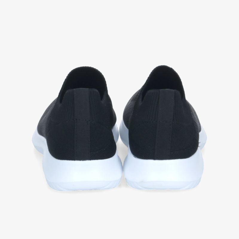 Schwarze Slip-On Schuhe mit weißer Gummisohle, bequem und leicht, mit rutschfester Sohle für optimalen Halt
