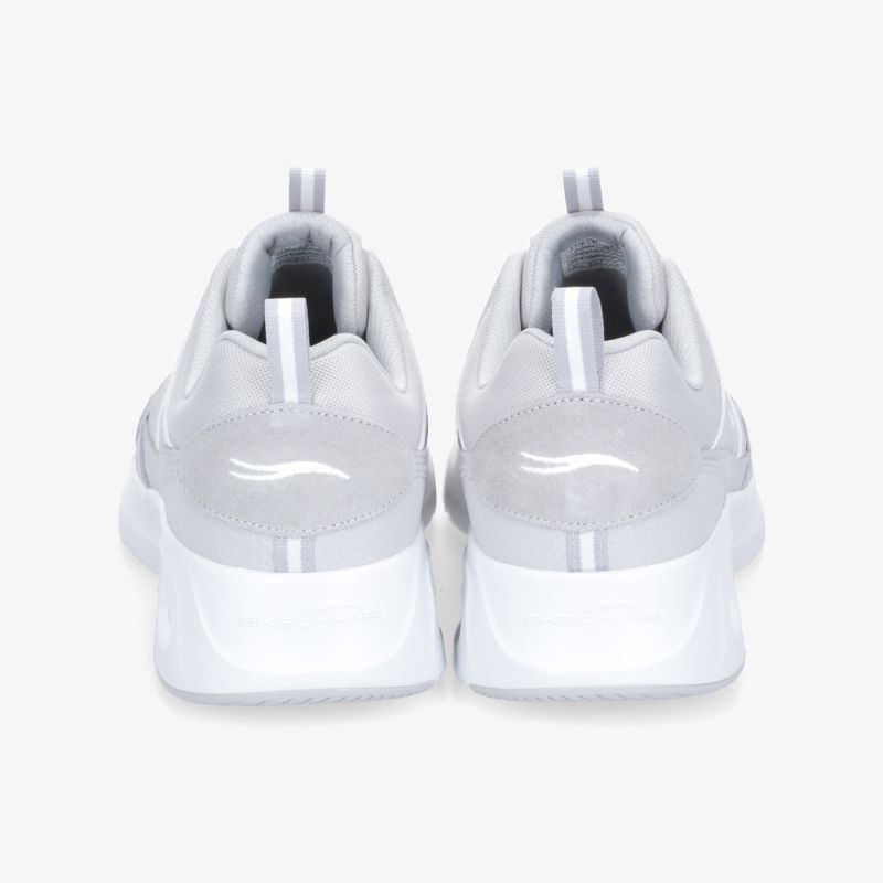 Graue Sneaker mit weißer Sohle, modernes Design, perfekte Passform und Komfort für den täglichen Gebrauch.