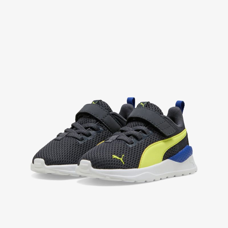 Sportliche Puma Schuhe mit atmungsaktivem Material, flexiblem Design und praktischem Klettverschluss in Blau und Gelb