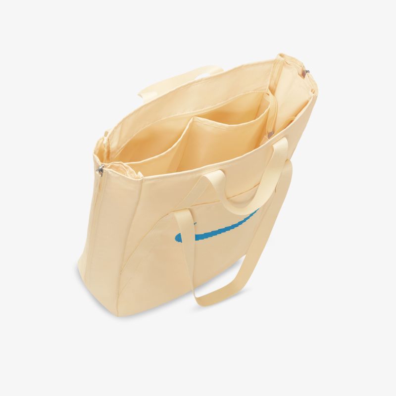 Elegante beige Tasche mit mehreren Innenfächern für optimalen Stauraum und stilvolles Design.