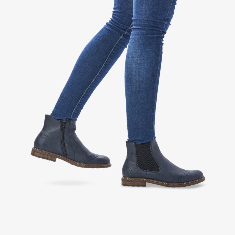 Blaue Lederstiefeletten mit elastischem Einsatz und robuster Sohle, ideal für den Alltag.