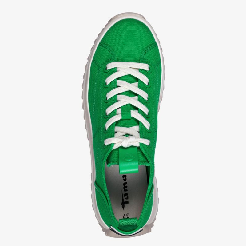 Grüner Sneaker mit weißer Sohle und Schnürung, bietet Komfort und Stil für den Alltag.
