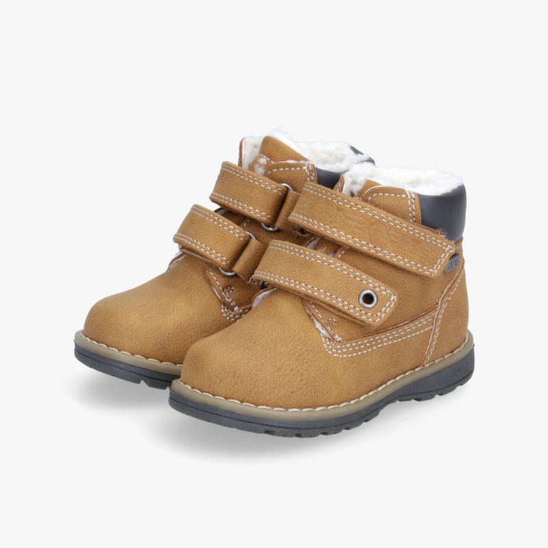 Stiefeletten mit Klettverschluss und flauschiger Innenfütterung für optimalen Komfort und Halt.