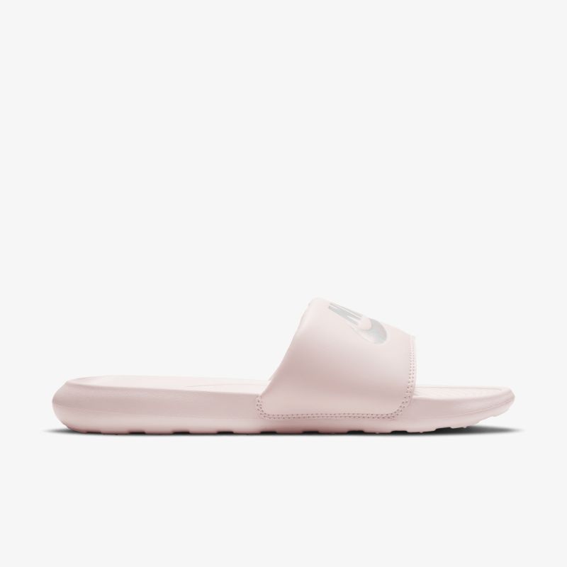Seitliche Ansicht einer rosa, bequemen und gepolsterten Slide Sandale mit rutschfester Sohle