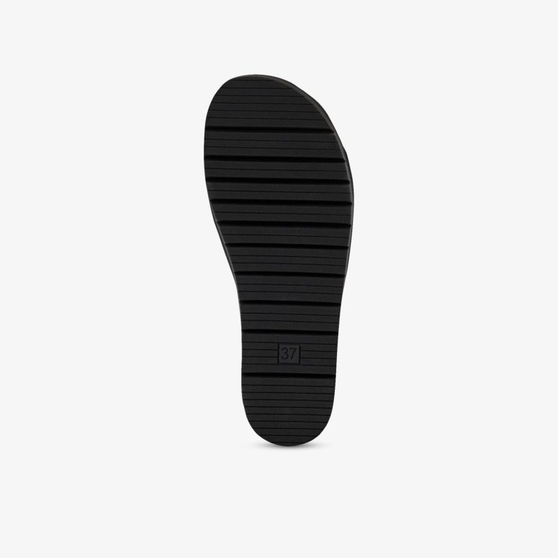 Schwarze profilierte Schuhsohle mit rutschfestem und robustem Design für sicheren Halt und Strapazierfähigkeit