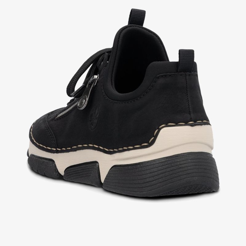 Schwarzer Schuh mit beiger Sohle, bequem und robust für den Alltag, seitliche Ansicht