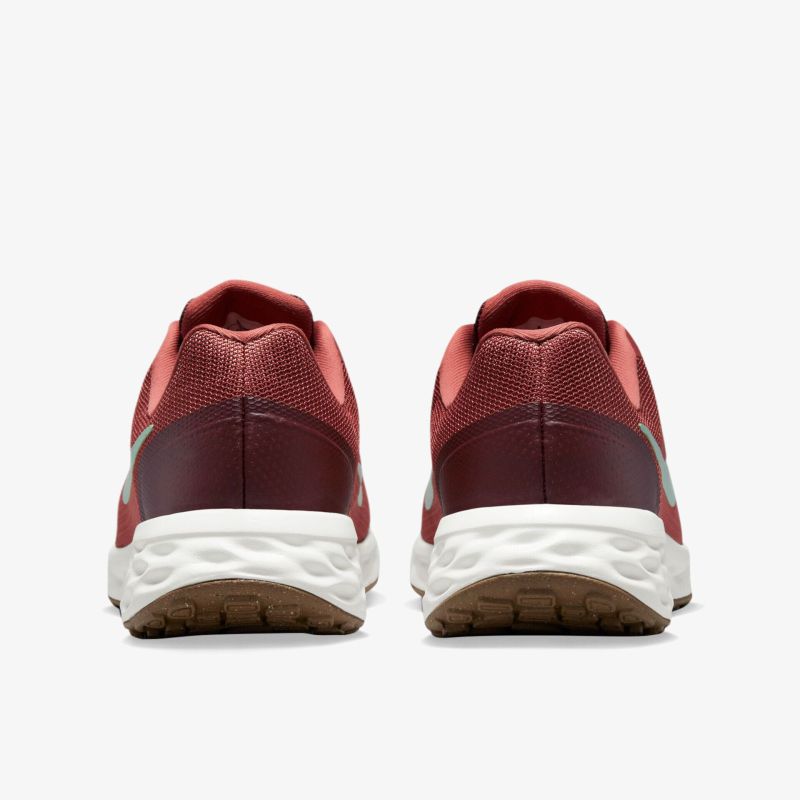 Laufschuhe in Rot-Weiß mit hervorragender Dämpfung und stabiler Sohle für optimalen Komfort und Leistung.