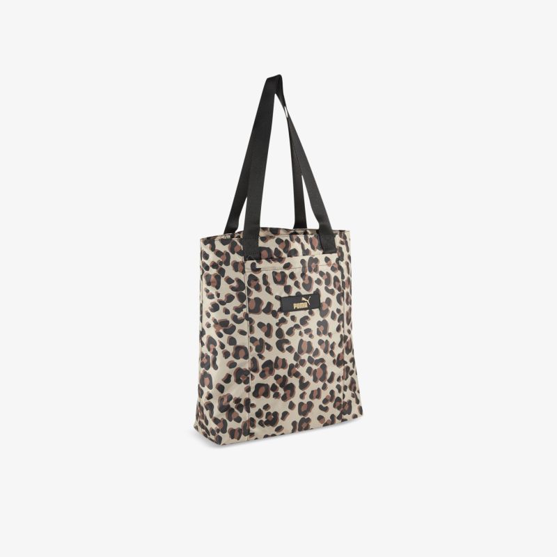Große Shopper Tasche mit auffälligem Leopardenmuster und schwarzen Tragehenkeln für vielseitigen Gebrauch