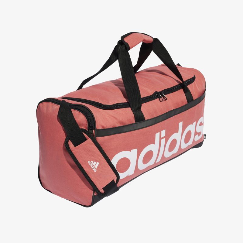 Stilvolle und geräumige adidas Sporttasche in Rosa mit robusten Tragegriffen und Reißverschluss.