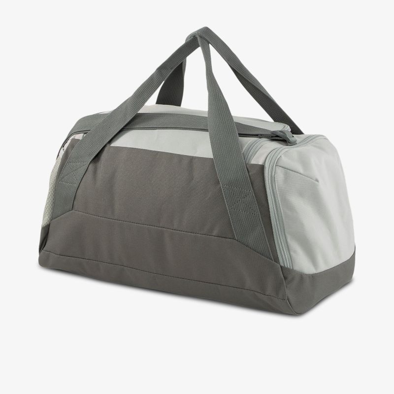 Robuste und geräumige graue Duffel Bag mit Reißverschlusstasche, ideal für Sport und Reisen.