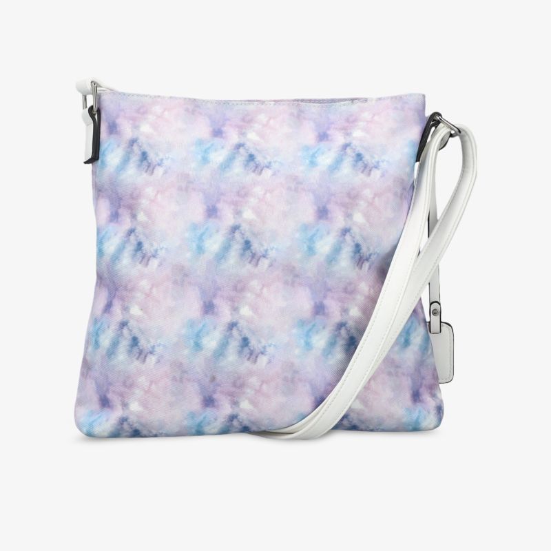 Elegante pastellfarbene Schultertasche mit modernem Muster und komfortablem weißen Trageriemen.
