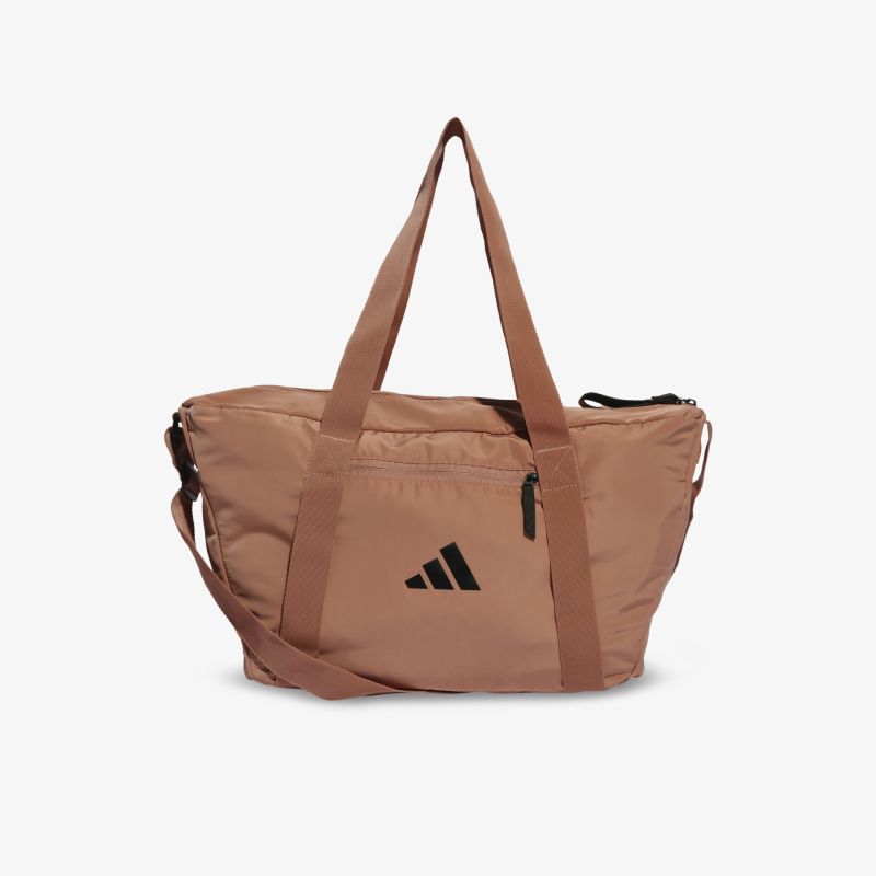 Geräumige Adidas Sporttasche mit robustem Design und praktischen Trageriemen in elegantem Braunton.