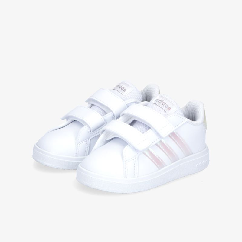 Weiße Sneaker mit Klettverschluss und Seitenstreifen für bequemen Tragekomfort und sportlichen Stil