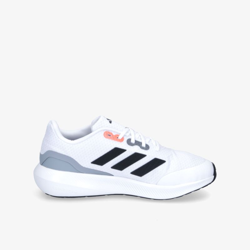 Moderner weißer Sneaker mit markanten schwarzen Streifen und komfortabler Sohle.