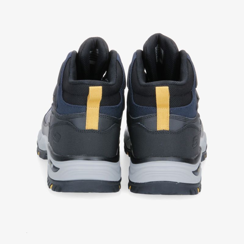 Sportliche schwarze Sneaker mit gelbem Akzent und gepolstertem Schaft für optimalen Komfort und Stil.