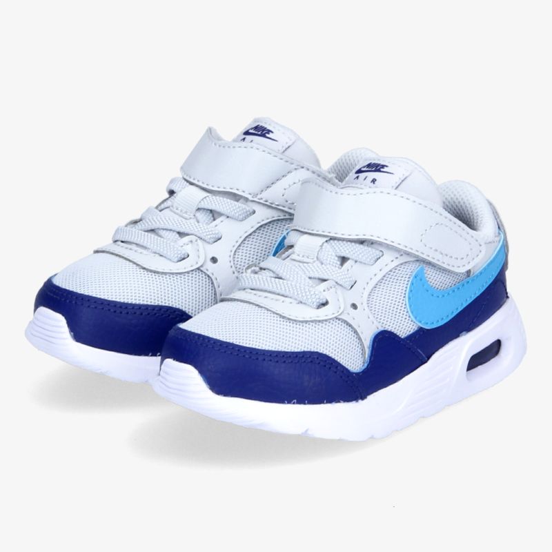 Bequeme, blaue Sneaker mit Klettverschluss und atmungsaktivem Mesh-Obermaterial für sportlichen Komfort.