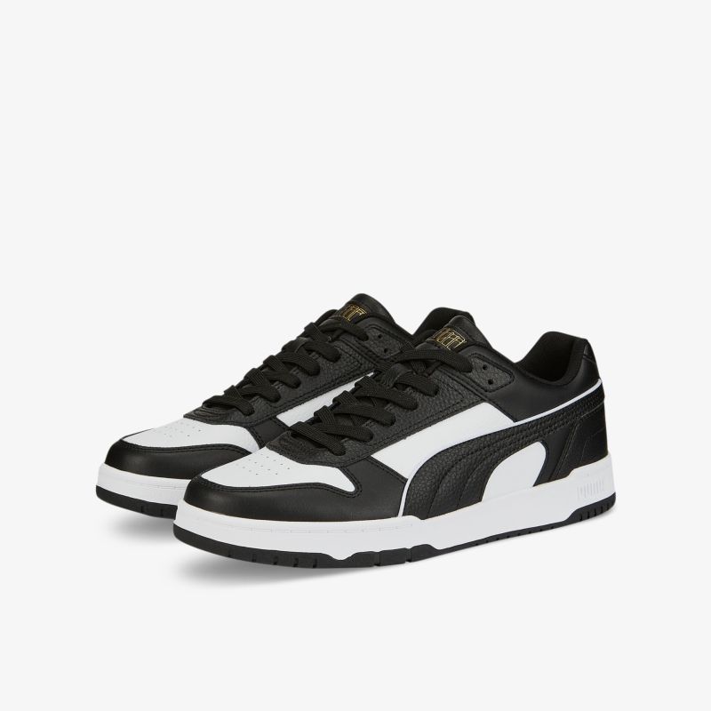 Stylische schwarze und weiße Sneaker mit modernem Design und hoher Bequemlichkeit für Freizeit und Sport