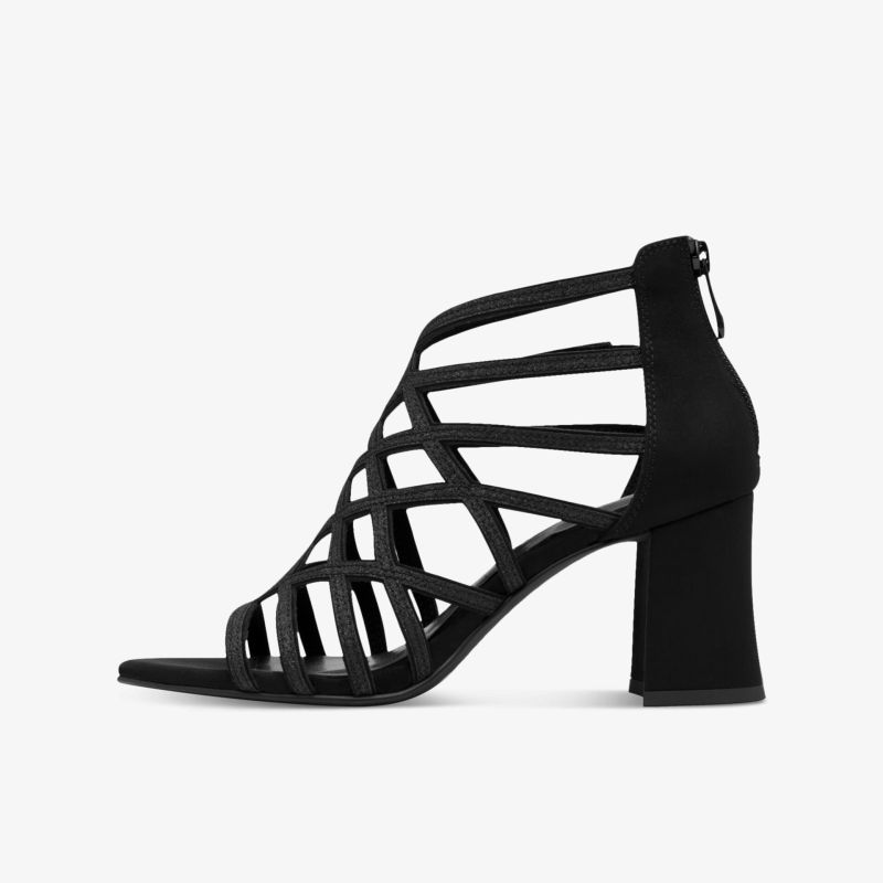 Eleganter schwarzer Riemchenschuh mit stabilem Blockabsatz und modischem Design in seitlicher Ansicht