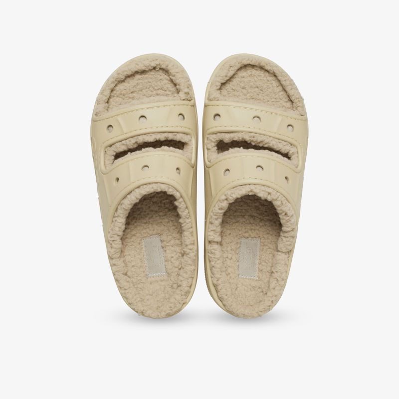 Beige Hausschuhe mit weichem Innenfutter und verstellbaren Riemen für optimalen Komfort und sicheren Halt