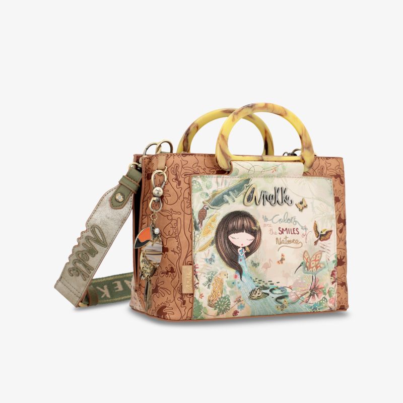 Stilvolle Handtasche mit künstlerischem Design, geräumig und elegant, für vielseitige Anlässe geeignet.