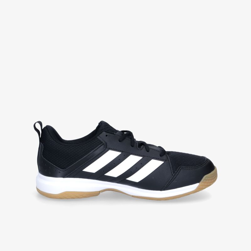 Stylische schwarze Turnschuhe mit weißen Streifen und rutschfester Sohle. Perfekt für Sport und Freizeit.