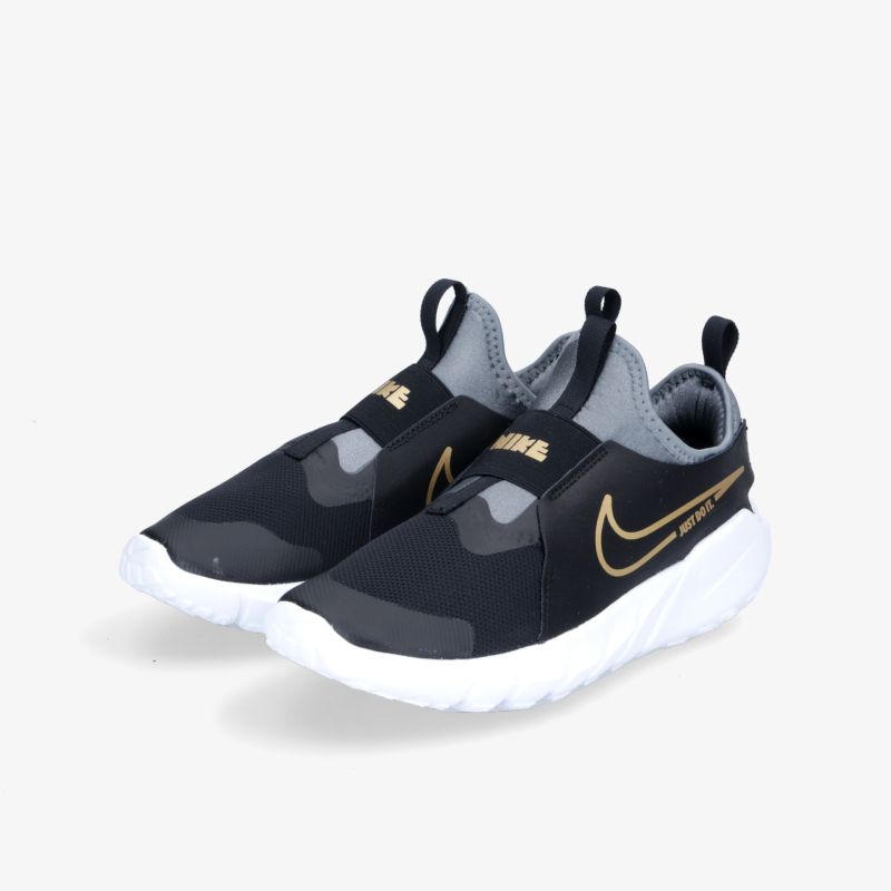 Moderne schwarze Slip-On-Sneaker mit goldenen Akzenten und weißer Sohle, ideal für Sport und Freizeit