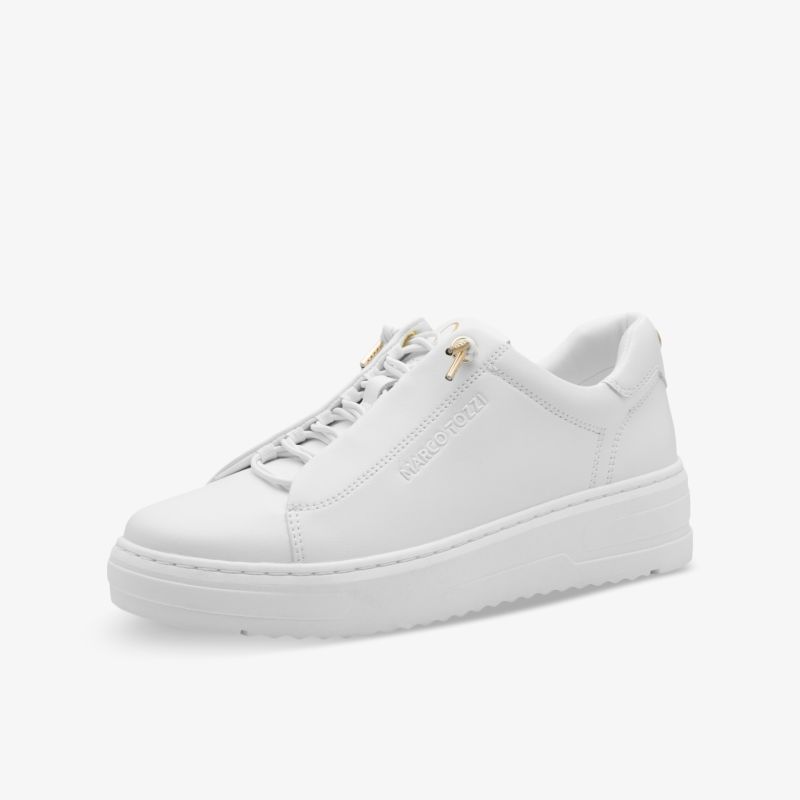 Moderner weißer Sneaker in seitlicher Ansicht mit bequemer Passform und rutschfester Sohle