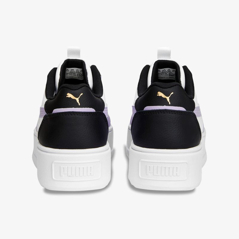 Schwarze Sportschuhe mit weißer Sohle und lila Akzent. Perfekt für einen modernen Look.