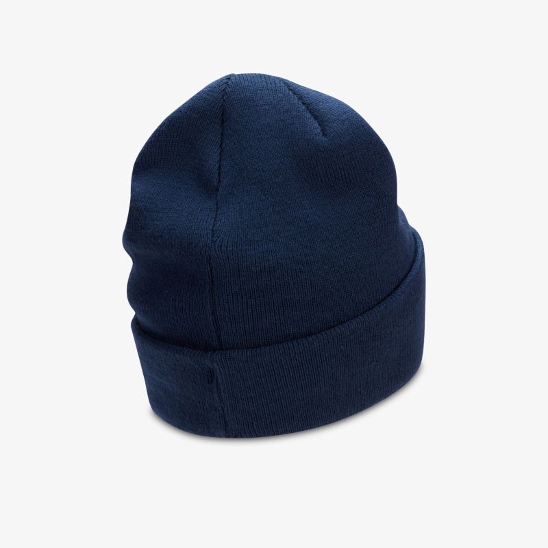 Blaue Mütze aus weichem Material, ideal für kalte Tage, bietet Wärme und Komfort