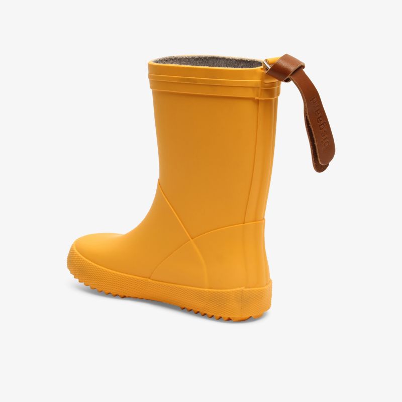 Wasserdichter, robuster gelber Gummistiefel mit Griff am Schaft, ergonomisch geformt und rutschfester Sohle, seitliche Ansicht