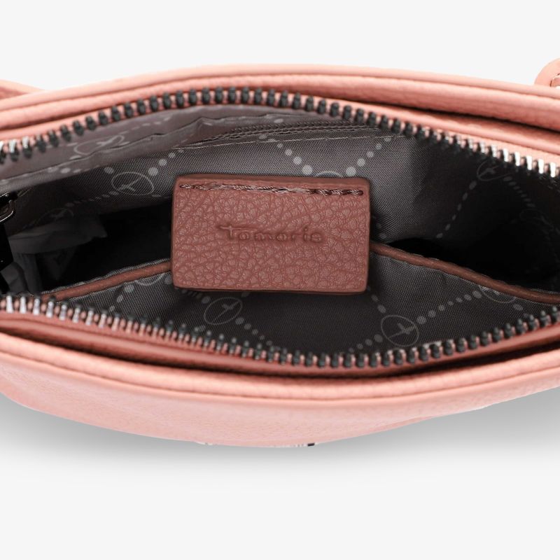 Detailaufnahme eines geöffneten Reißverschlussfachs mit sauberer Verarbeitung und praktischem Innenfach