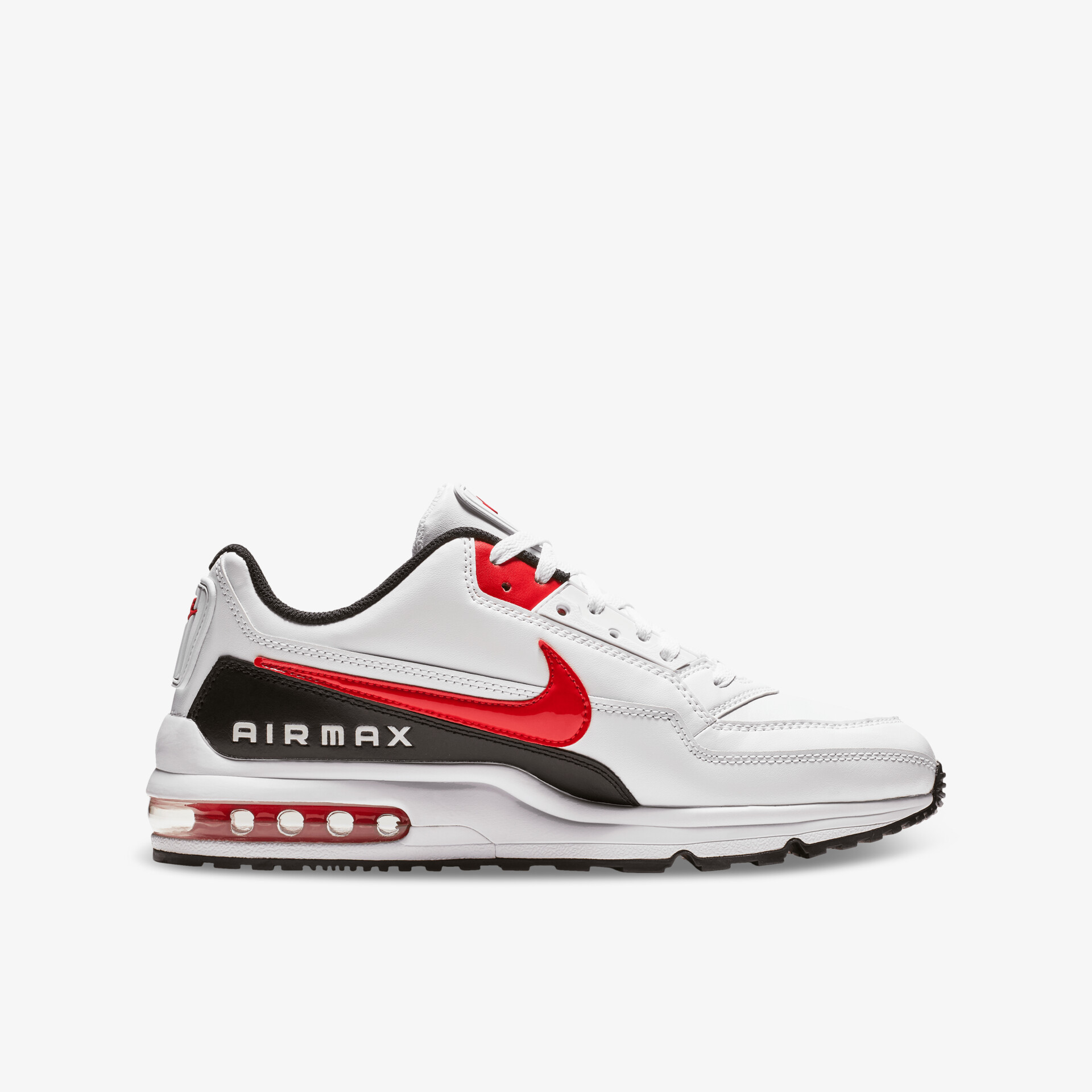 Seitliche Ansicht eines weißen Sport-Schuhs mit rotem Nike-Logo und sichtbarer Airmax-Dämpfung für optimalen Komfort