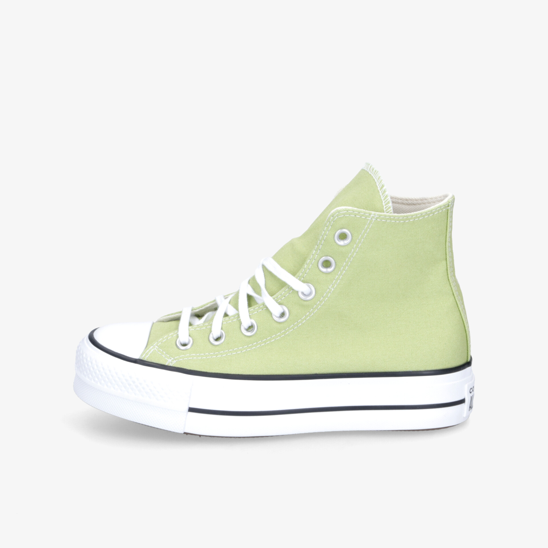 Grüner Leinenschuh mit robuster weißen Sohle und klarer seitlicher Ansicht, komfortabel und modisch