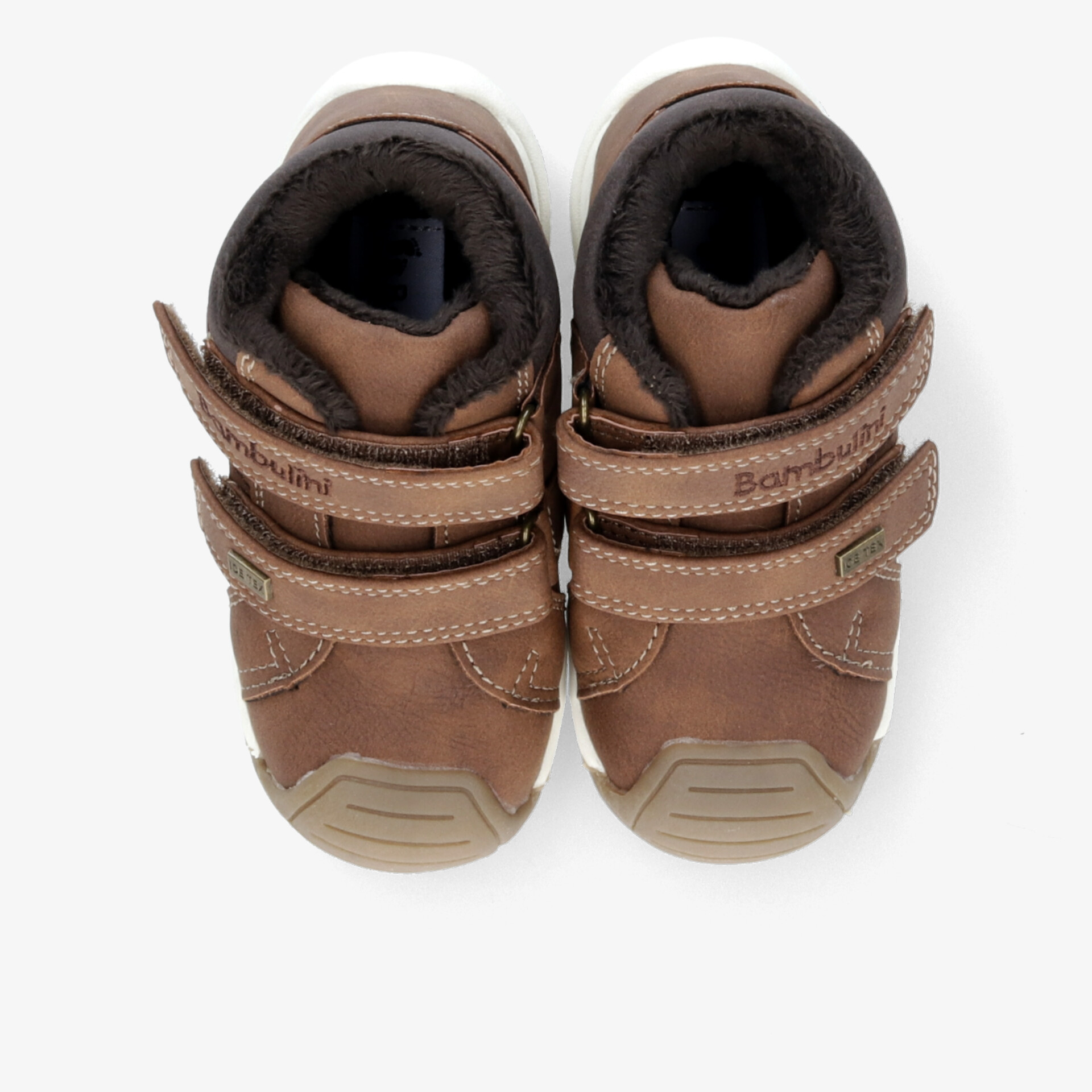 Braune Schuhe mit robusten rutschfesten Sohlen und verstellbaren Klettverschlüssen, aus der Draufsicht gezeigt