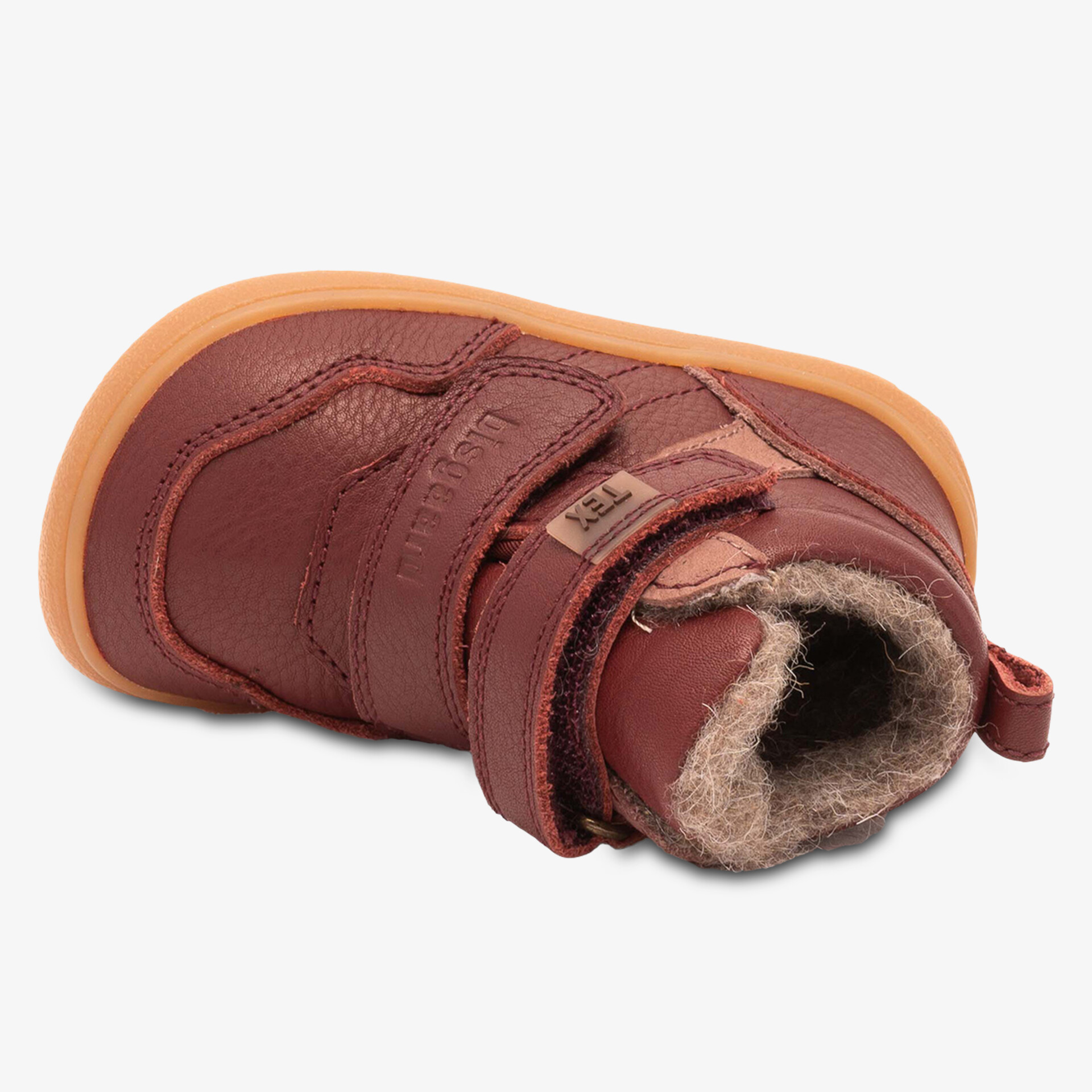 Warmer, gefütterter Schuh aus Leder mit robustem Klettverschluss und rutschfester Sohle für sicheren Halt