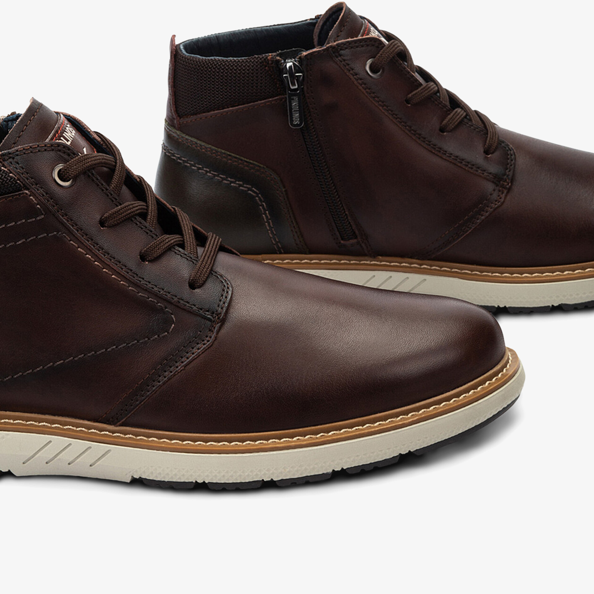 Elegante braune Schnürschuhe aus hochwertigem Leder mit praktischem Reißverschluss und weißer Sohle