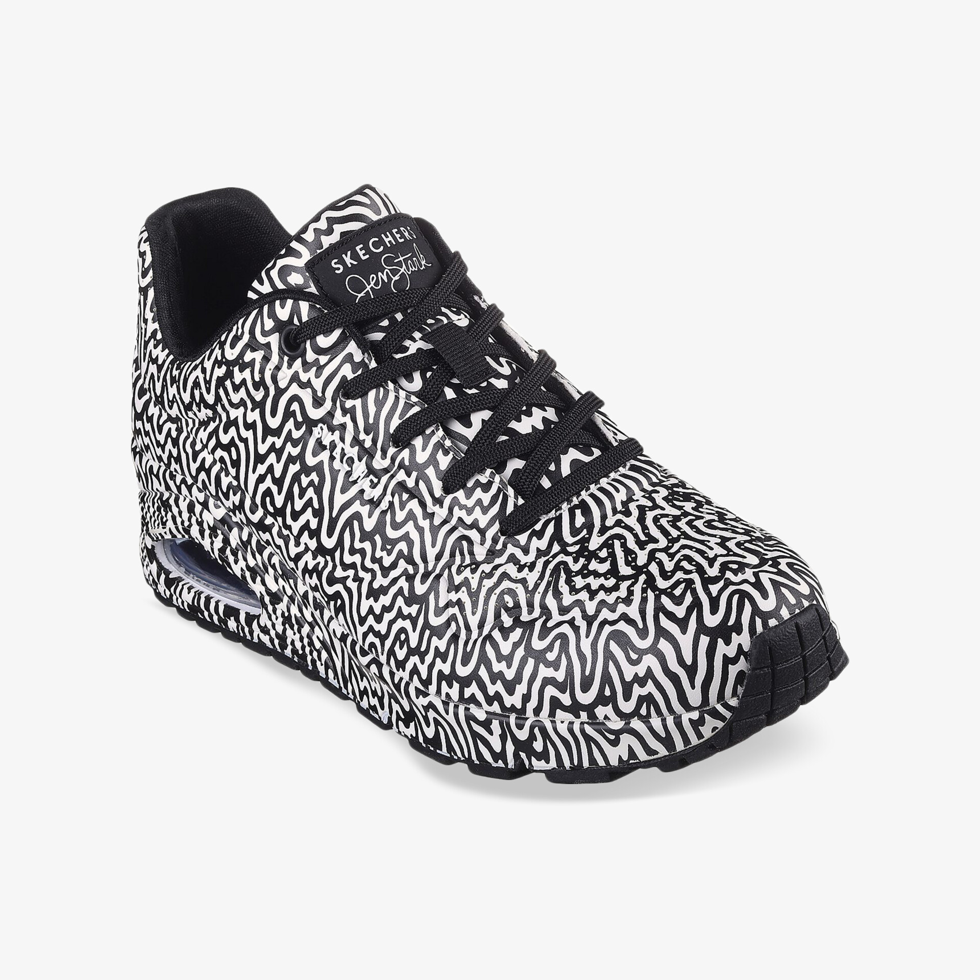Sportlicher Sneaker mit schwarz-weißem Zickzackmuster in Frontansicht, bequem und leicht für aktiven Alltag