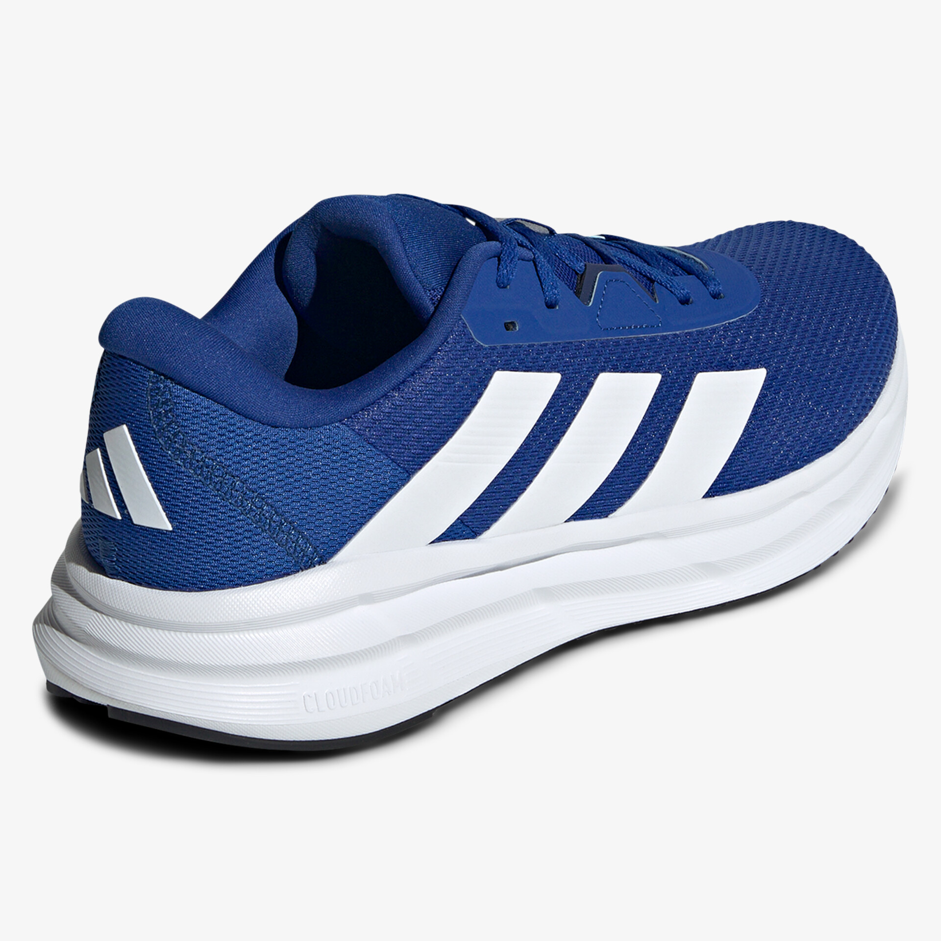 blauer Sportschuh mit weißer Profilsohle und Markenlogo, seitliche Ansicht, leichter Laufschuh für Komfort