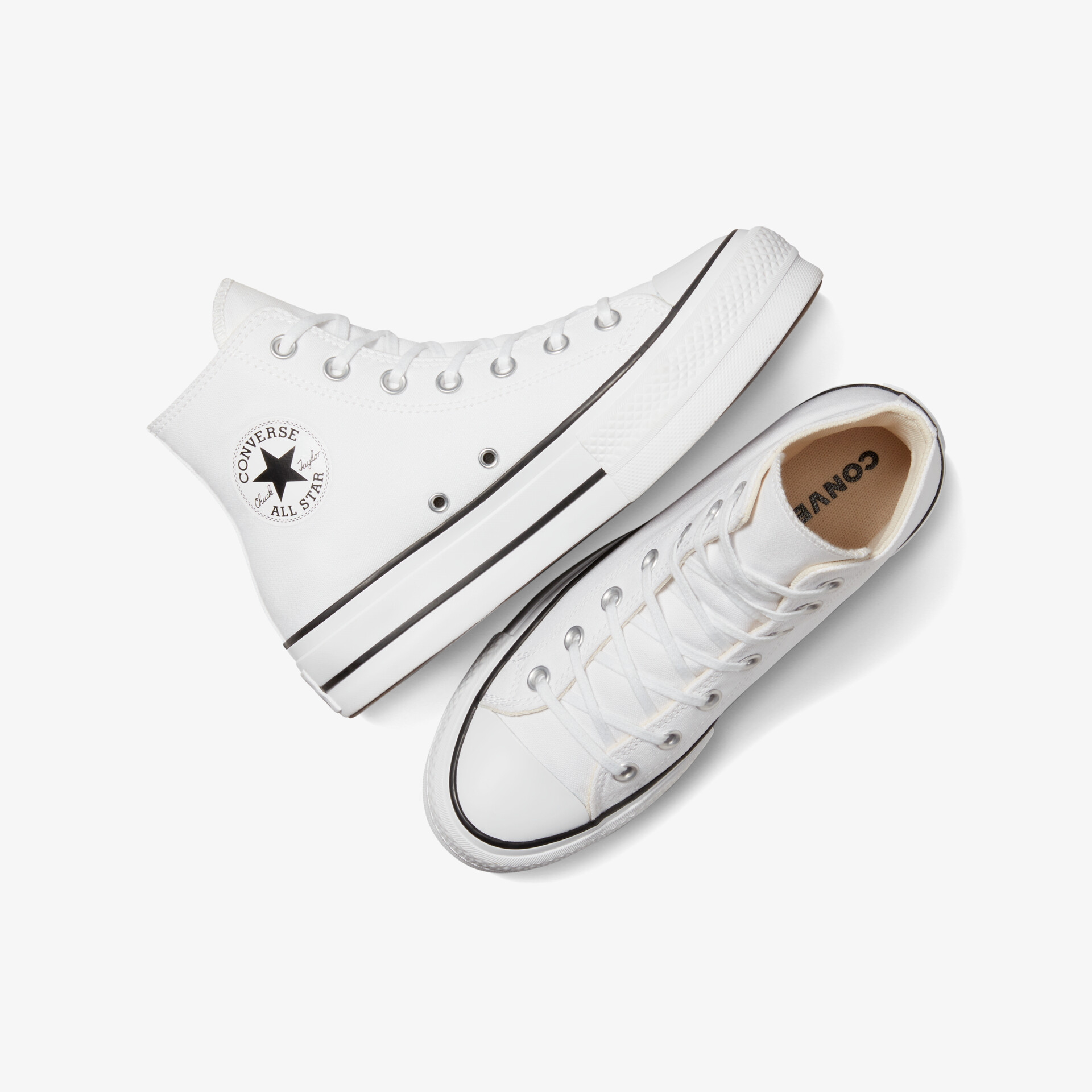 Weißes Sneaker-Paar mit klassischem Design und robuster Gummisohle, bequem und vielseitig kombinierbar