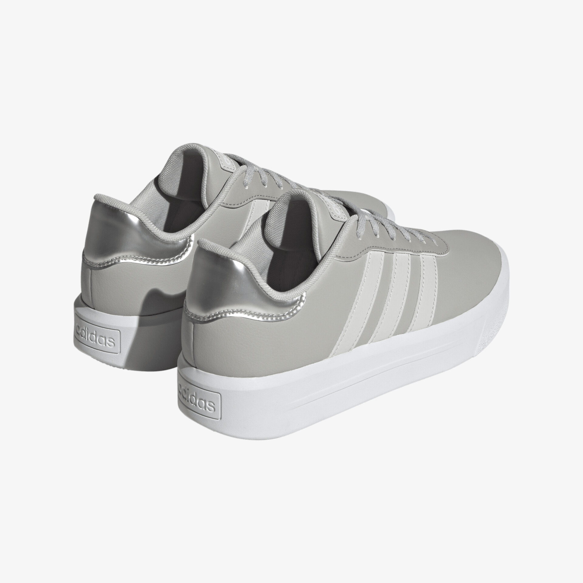 Graue Sneaker mit weißer Sohle und ikonischen Streifen. Komfortabel und für jeden Anlass geeignet.