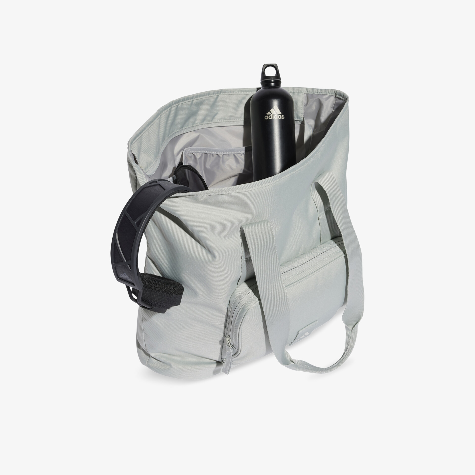Geräumige graue Tasche mit praktischem Innenraum und robuster Wasserflasche, ideal für unterwegs und sportliche Aktivitäten