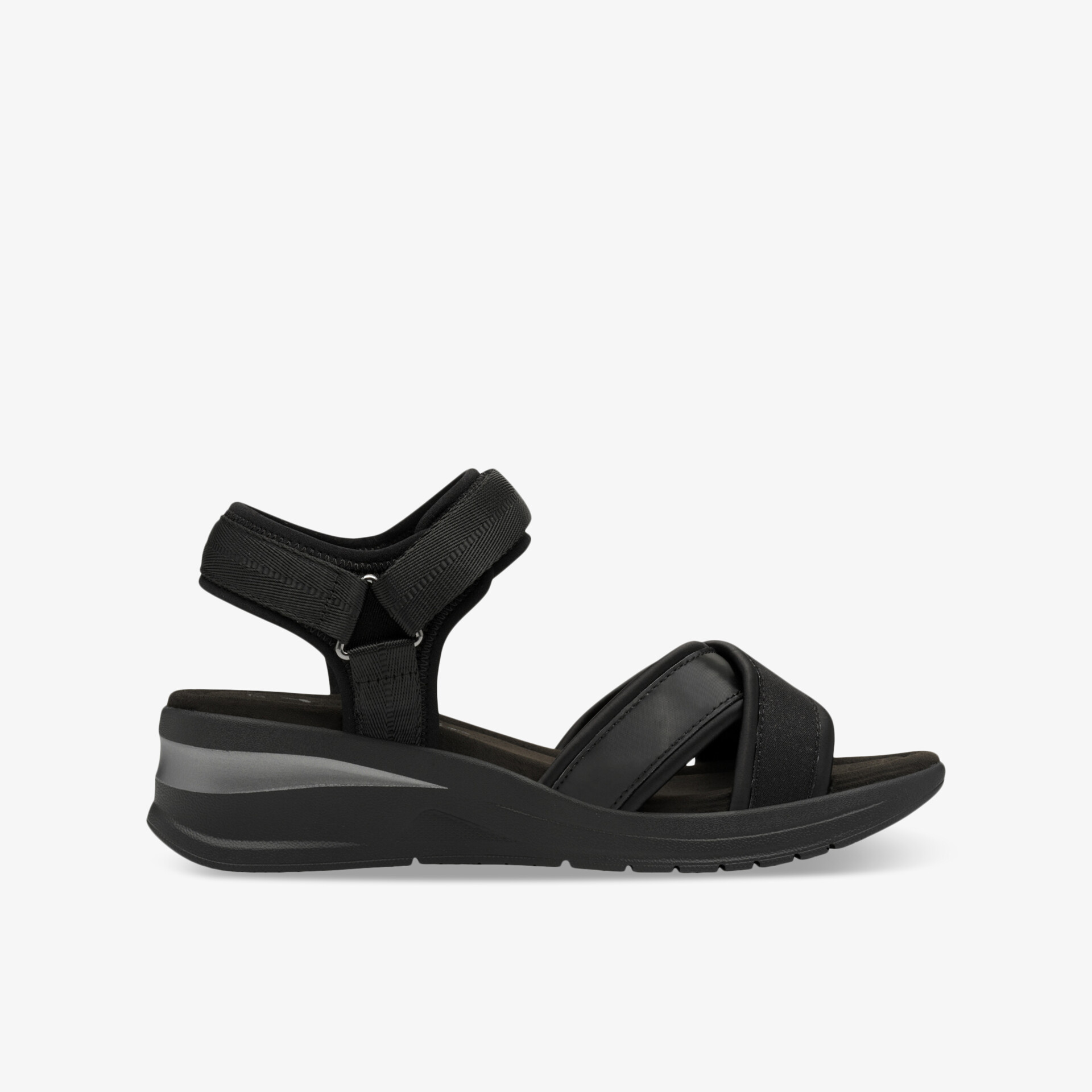 Schwarze verstellbare Sandale mit gepolstertem Fußbett und rutschfester Sohle, seitliche Ansicht