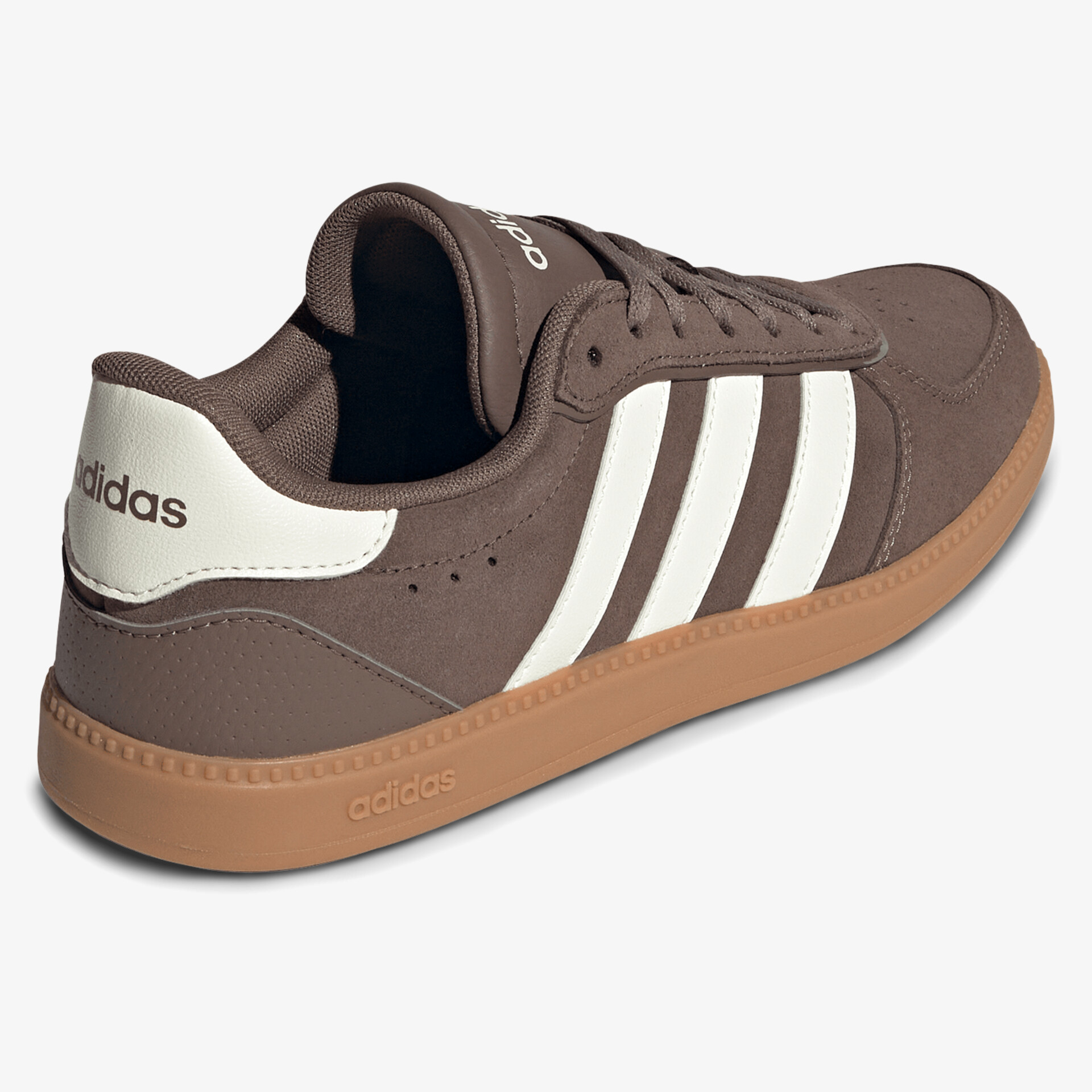 Sportlicher brauner Sneaker mit weißer Ferse und Gummisohle, seitliche Ansicht