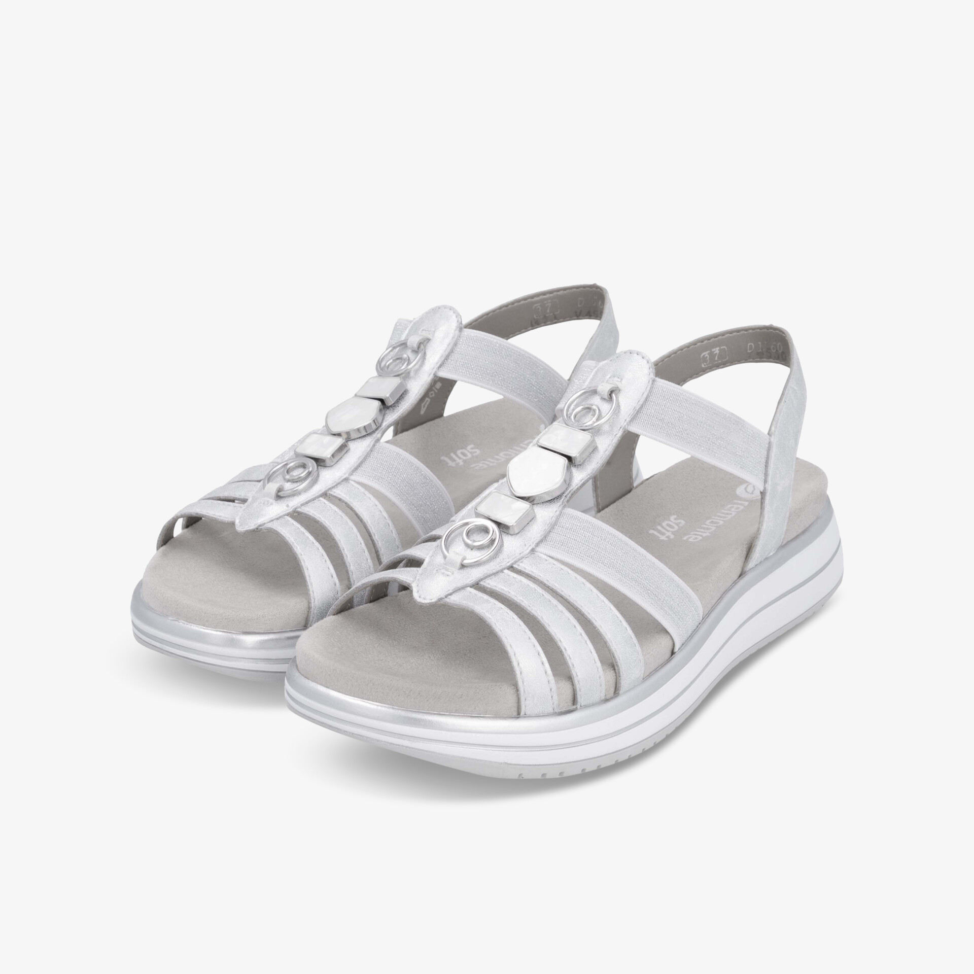 Weißes Paar Sandalen mit verstellbaren Riemen und gepolsterter Sohle, leicht und bequem für sommerlichen Komfort