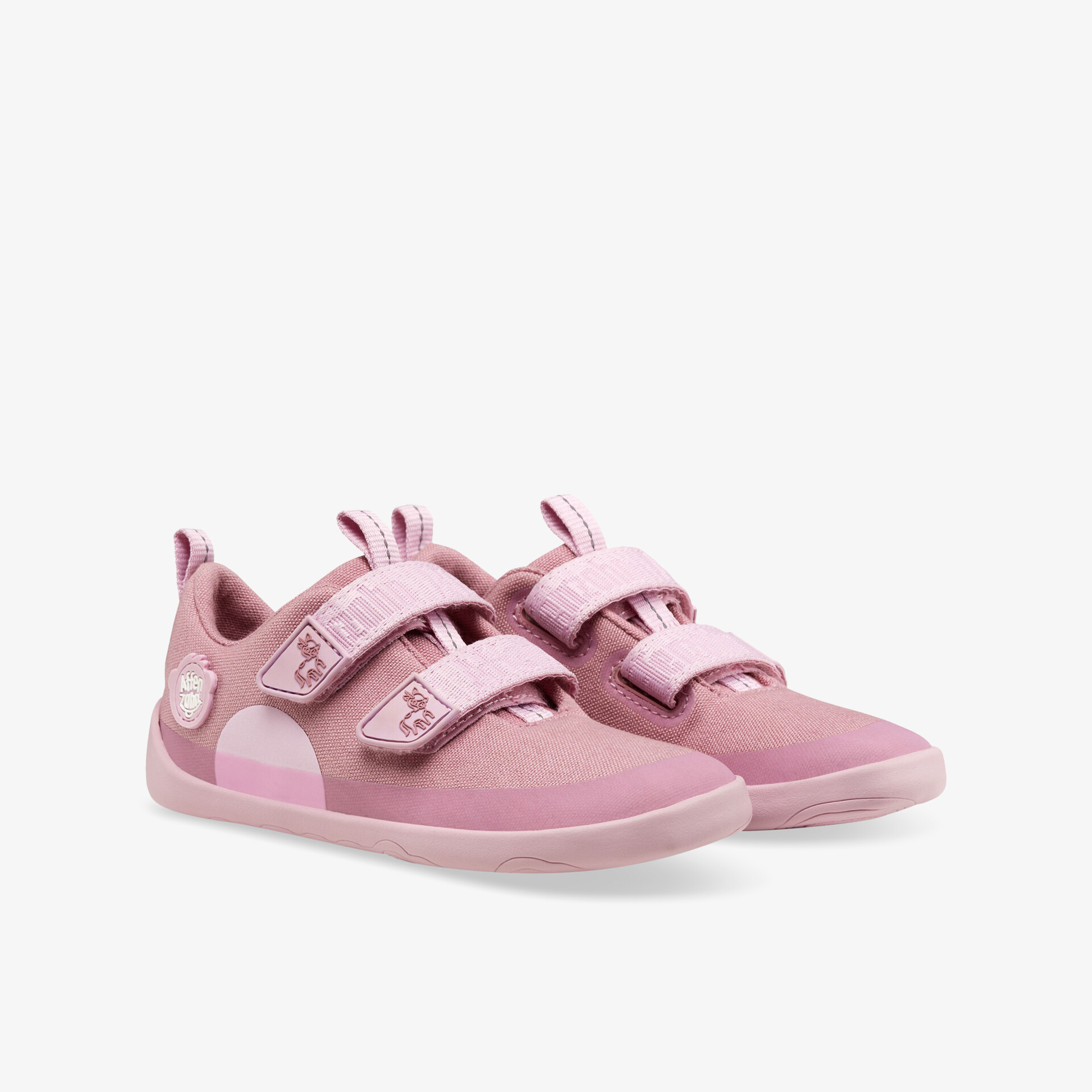 Stylische pinke Sneaker mit Klettverschluss, leicht und atmungsaktiv für optimalen Komfort und sicheren Halt.