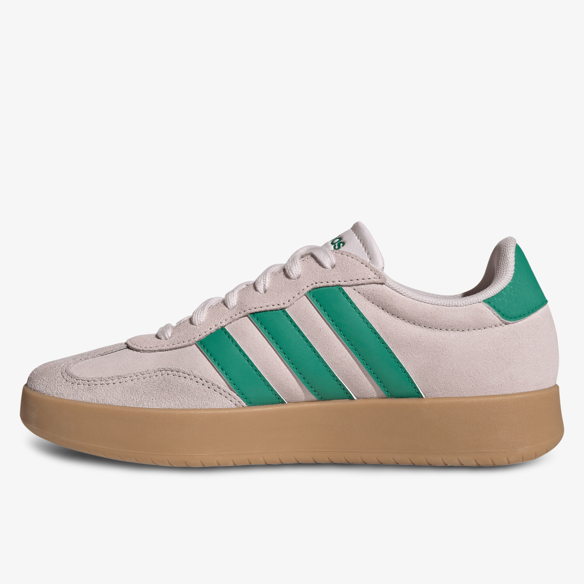 Seitliche Ansicht eines bequemen Sneakers mit modischem Design und grünen Akzenten auf heller Oberfläche