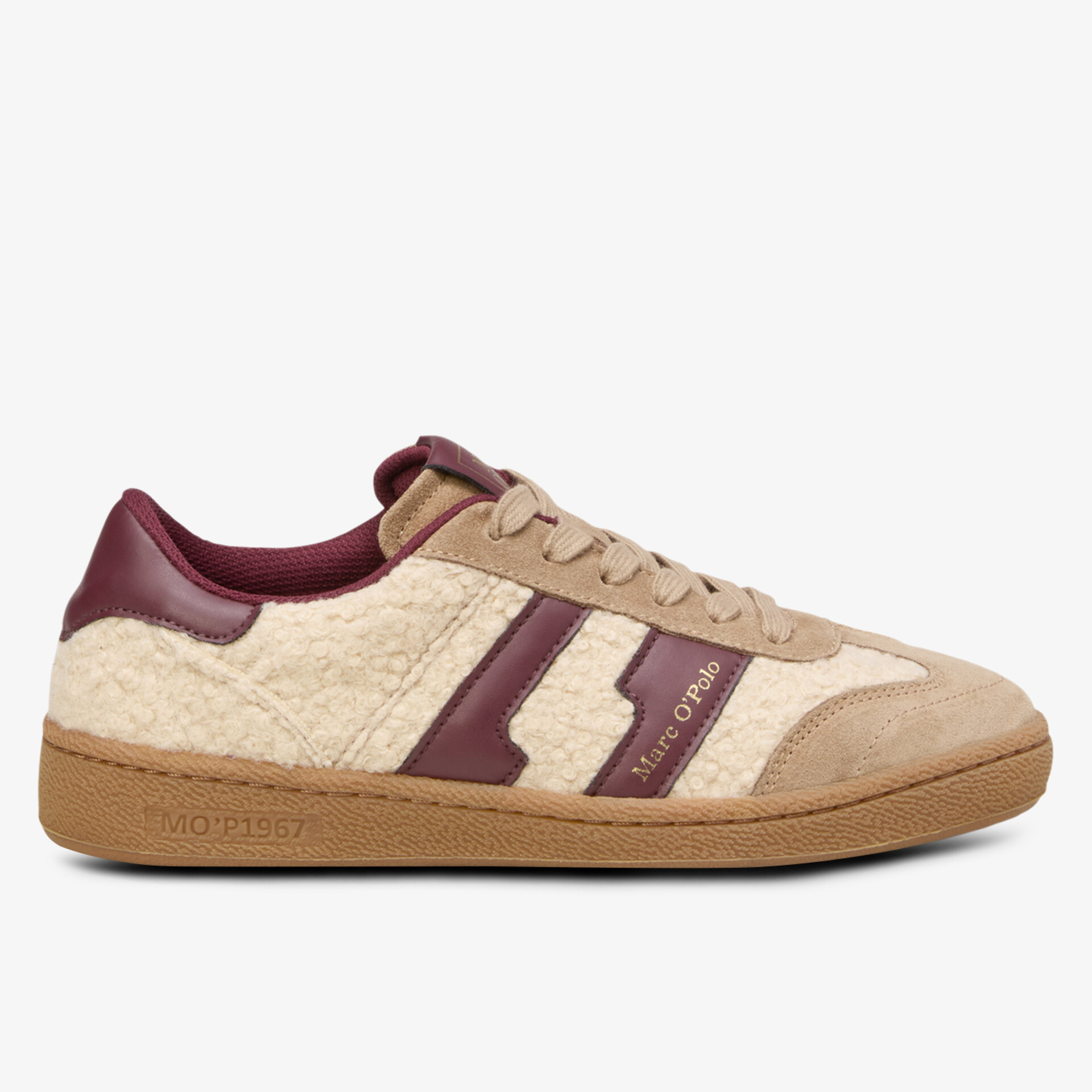 seitliche Ansicht eines bequemen Sneakers mit robuster Gummisohle und edlem zweifarbigen Design