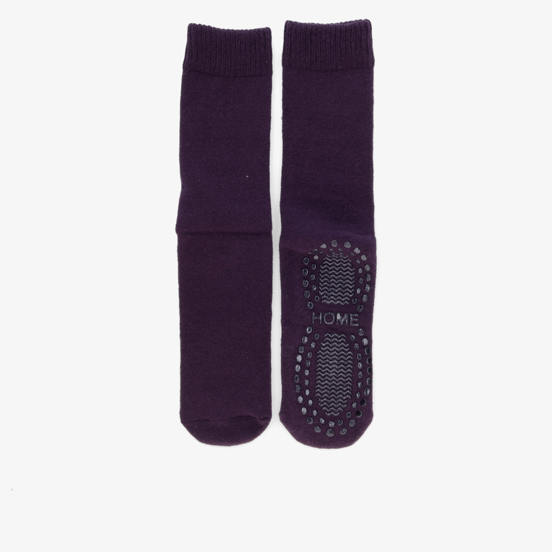 Lilafarbene Socken mit Antirutschsohle für maximalen Komfort und Sicherheit beim Tragen.
