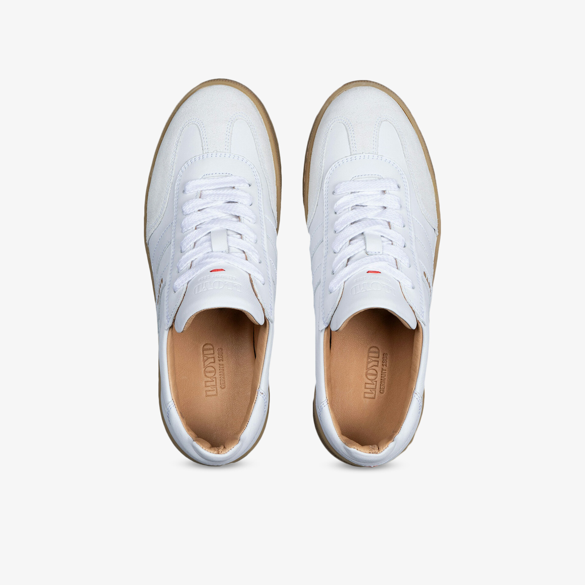 Elegantes Paar weißer Ledersneaker mit runder Form und Schnürung, leichte und bequeme Schuhe für Alltag