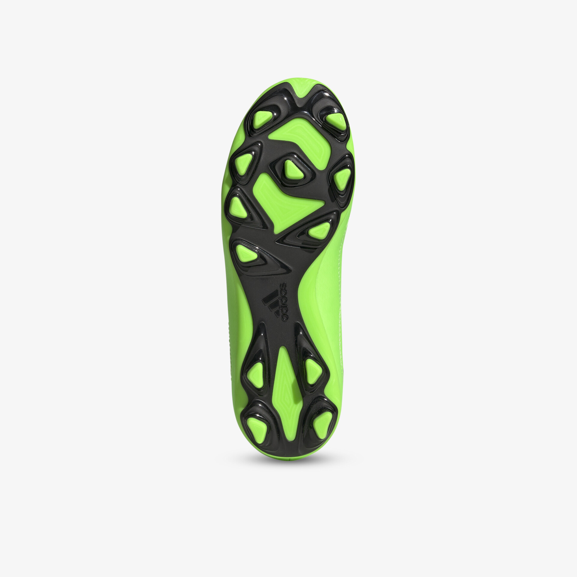 Robuste grüne Fußballschuh-Sohle mit strategisch platzierten Stollen für optimale Stabilität und Traktion auf dem Spielfeld.
